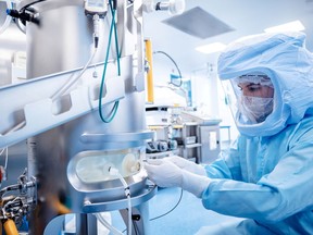 A handout image shows the manufacturing process of the Pfizer-BioNTech COVID-19 vaccine with the execution of the first step with the active pharmaceutical ingredient mRNA at a production facility in Marburg, some 90 km north of Frankfurt, Germany.