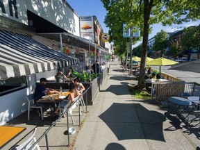 File photo of patios on Main Street in Vancouver. Photo by Arlen Redekop / Vancouver Sun / The Province.