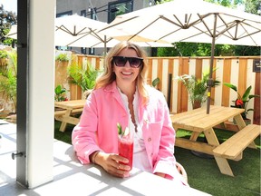 Jane McFadden, executive director of the West 4th Avenue Business Improvement Association, on the patio at Bimini's.