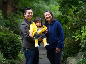 Mom Kathy, dad Terry and toddler Maddy near their home in Vancouver, June 13, 2021. They're looking forward to the return of playdates under B.C.'s restart plan.