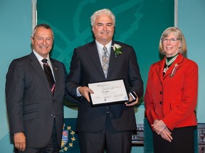 A 2016 photo of Jay Yule (centre) with Honourable Judith Guichon, OBC, Lieutenant Governor of British Columbia and Honourable Peter Fassbender, Minister of Community, Sport and Cultural Development at the 13th annual British Columbia Community Achievement Awards ceremony held at Government House in Victoria.