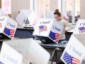 A woman votes at James Island Charter High School on Election Day on November 3, 2020 in Charleston, South Carolina.