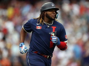 Vladimir Guerrero Jr. of the Toronto Blue Jays rounds the bases after hitting a home run in the third inning during the 91st MLB All-Star Game at Coors Field on July 13, 2021 in Denver, Colorado.