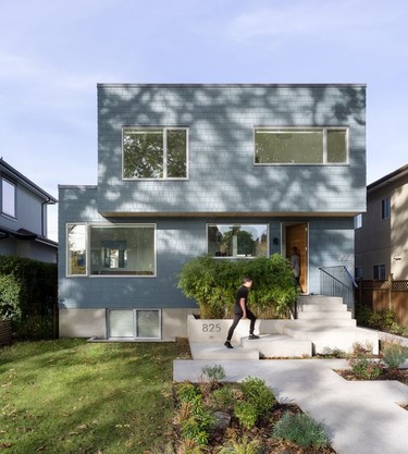 Nicknamed Stack for its likeness to two stacked boxes, the home's futuristic form allowed architect Hitesh Neb to maximize living space within the footprint, while accommodating a large rooftop deck. The exterior is painted Nocturnal Gray by Benjamin Moore.