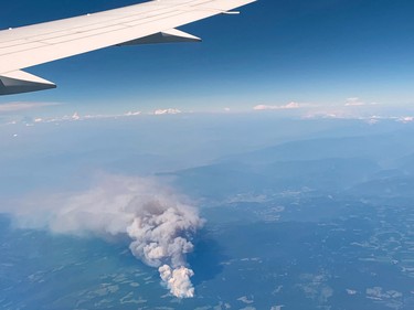 A view shows a wildfire seen from an airplane, in Lytton, British Columbia, Canada June 30, 2021 in this picture obtained from social media on July 1, 2021.