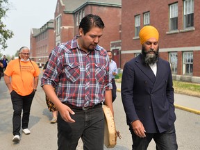 NDP Leader Jagmeet Singh tours the site of the former residential school in Kamloops on Thursday.