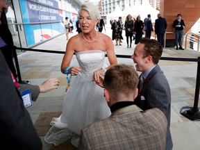 Newspaper columnist Katie Hopkins arrives dressed in a wedding dress at the Conservative Party's conference in Manchester, Britain October 2, 2017.