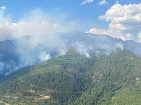 The Akokli Creek fire in southeastern British Columbia has been burning for more than two weeks after being ignited by lightning on July 9.
