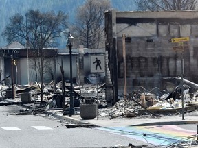 The charred remnants of homes and buildings, destroyed by a wildfire on June 30, are seen during a media tour by authorities in Lytton, British Columbia, Canada July 9, 2021.