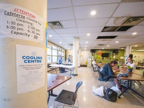 People visit a cooling centre on Alexander Street in Vancouver’s Downtown Eastside during June’s record-breaking heat wave. Many communities will have the centres open again this weekend.