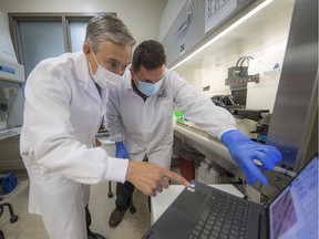 Federal Minister of Innovation François-Philippe Champagne with research scientist Hesham Soliman during a visit to Aspect Biosystems on Wednesday,