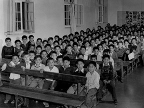 Photo of students in assembly hall of the Alberni Indian Residential School. Undated.