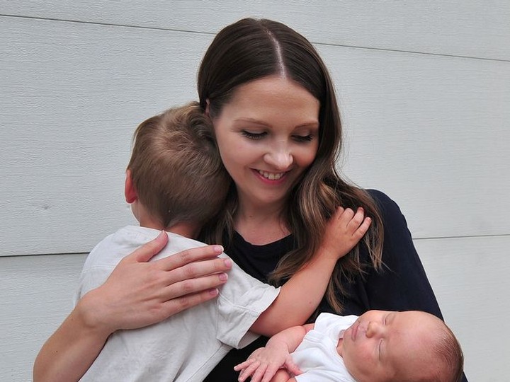  Natalie Meyers with her son Judah and baby Elliott in White Rock, on July 7. ‘I hope no one else has to go through what I went through,’ she says now.