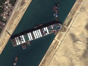 Ever Given container ship is pictured in Suez Canal, in Suez Canal in this Maxar Technologies satellite image taken on March 27, 2021.