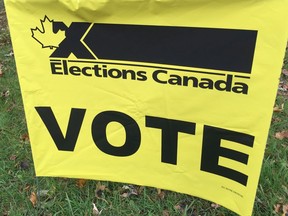 Square Elections Canada vote sign, outside a Canadian voting station.