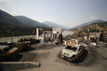 Damaged structures and vehicles are seen in Lytton, B.C., on Friday, July 9, 2021, after a wildfire destroyed most of the village on June 30.