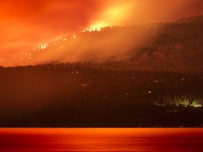 File photo of the White Rock Lake wildfire near Vernon. Firefighters are facing unprecedented challenges.