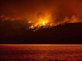 FILE PHOTO: The White Rock Lake fire burns near Vernon's Westside on Aug. 6, 2021.