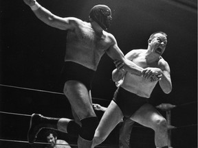 The Vancouver Sun archives don't have any photos of 1930s wrestler Howard Cantonwine. But he would have gotten along with Mean Gene Kiniski, right, who is shown battling Moose Morowski at the PNE Gardens on Dec. 26, 1980.