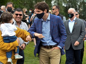 Prime Minister Justin Trudeau ‘works the room’ with the public in Coquitlam last month, with B.C. Premier John Horgan (right) in tow.