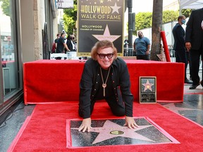 Don McLean poses while being honoured with a star on the Hollywood Walk of Fame on August 16, 2021 in Hollywood.