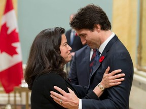 Prime Minister Justin Trudeau speaks with Minister of Justice Jody Wilson-Raybould during a swearing-in ceremony at Rideau Hall, in Ottawa November 4, 2015.