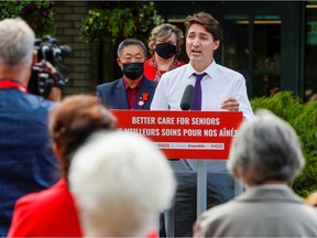 Liberal leader Justin Trudeau visits a veterans' retirement home during his election campaign tour in Victoria on Aug. 19, 2021.