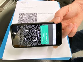 A test scan of a vaccine passport is shown at an Econofitness gym in Laval, Quebec, Canada August 17, 2021.  This passport is similar to the one being implemented in B.C.