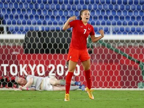 Twenty-year-old Julia Grosso of Vancouver, who came on as a substitute in the gold medal women’s soccer match, looks to her teammates after scoring the final, winning goal on penalties in the Olympic final against Sweden at the 2020 Summer Olympics in Yokohama, Japan, on Aug. 6, 2021.