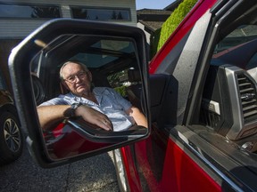 Chris Pedersen with his truck that was involved in an accident that was deemed by ICBC to be 50-percent Pedersen's responsibility. He disputed that claim and won an $8,000 settlement.