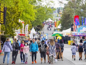 People enjoying the opening day of the PNE on Saturday, Aug. 21, 2021.