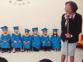 Dr. Madeline Chung, in an undated file photo, certainly has these youngsters’ attention. She delivered thousands of babies at St. Paul’s, Vancouver General and the former Grace hospitals over five decades, until the early 1990s.