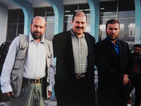 Hakim Zazem with two of his three brothers, all of whom remain in Afghanistan.