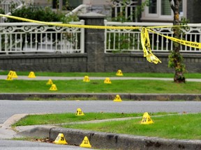 The scene of early Monday morning’s shooting spree at West 63rd Avenue and Ash Street in Vancouver. No one was injured and no one was in the house that was riddled with bullets.