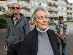 Dianne Miller (centre) with Pierre Queviellon (left) and Stephen James, all displaced by the fire that destroyed Lytton. Both men are staying at the Sandman Hotel in Abbotsford.