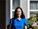 Huawei Technologies Chief Financial Officer Meng Wanzhou leaves her home to attend a hearing in Vancouver, August 4, 2021. 
