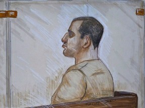 Reza Moazami is shown the prisoner's box in a Vancouver court in 2013.