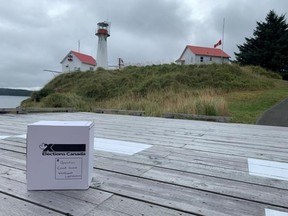 An Elections Canada ballot box is seen on a helicopter pad at the Scarlett Point Lighthouse station on Balaklava Island, B.C., in this recent handout photo.
