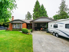This West Cloverdale rancher was listed for  $1,250,000 and sold for  $1,279,000.