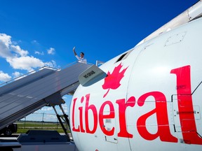 Justin Trudeau arrives at Toronto's Pearson International airport on September 19, 2021. He probably isn't waving at anyone; Trudeau just does this whenever he gets off an airplane so that it makes for a better picture.