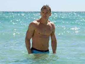 'I knew what I was doing': Daniel Craig said it was his idea to wear the tiny blue swim trunks in the memorable scene in 2006's Casino Royale.