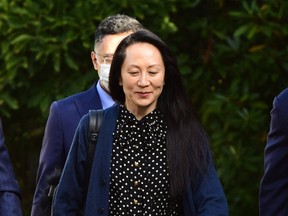 Huawei CFO Meng Wanzhou leaves her Vancouver home to attend her extradition hearing on Friday, Sept. 24, 2021.