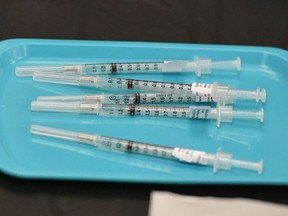 In this file photo syringes of Pfizer-BioNTech vaccine at a Covid-19 vaccination site at the University of Nevada in Las Vegas on March 15, 2021.