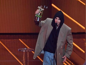 Canadian singer Justin Bieber acepts the Artist of the Year award during the 2021 MTV Video Music Awards at Barclays Center in Brooklyn, New York, September 12, 2021.