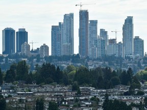 Single-family homes and condo towers are pictured in Burnaby on Aug. 31.