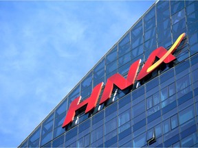 FILE PHOTO: The HNA Group logo is seen on the building of HNA Plaza in Beijing, China February 9, 2018.  REUTERS/Jason Lee/File Photo