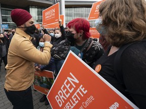 NDP Leader Jagmeet Singh is greeted by supporters as he arrives in downtown Vancouver, on Monday, Sept. 20, 2021.