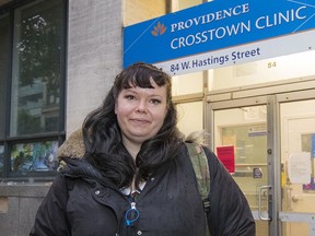 Coral Watson in front of Crosstown Pharmacy on West Hastings Street in Vancouver.