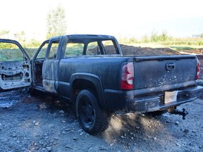 The Integrated Homicide Investigation Team says detectives are still working to identify the body found inside this burning truck early Saturday morning in Maple Ridge.