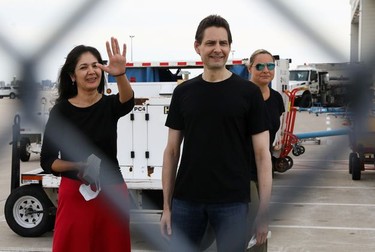 Former diplomat Michael Kovrig and his wife Vina Nadjibulla react following his arrival on a Canadian air force jet after his release from detention in China, at Pearson International Airport in Toronto, Ontario.